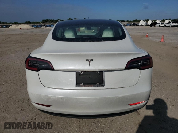 2021 Tesla Model 3 Standard Range Plus with VIN 5YJ3E1EA4MF089259, listed as a Copart auction lot 75398924 with 32,166 mi miles and Salvage Title. Bid and sale history available at DreamBid. Image 6.