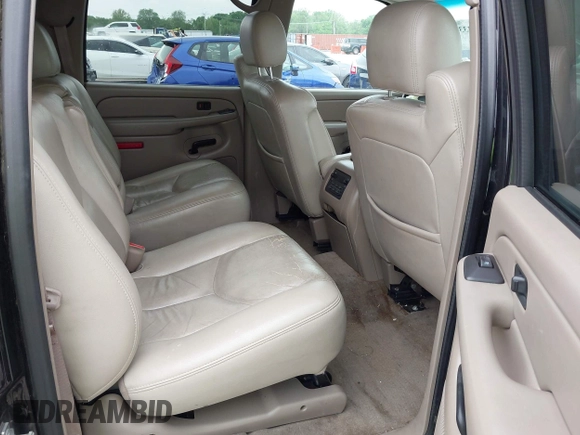 2004 Chevrolet Suburban LT z VIN 1GNFK16ZX4J291419, wystawiony jako IAAI lot #42163331 z przebiegiem 235 054 mil mil oraz . Historia ofert i sprzedaży dostępna na DreamBid. Obrazek 8.