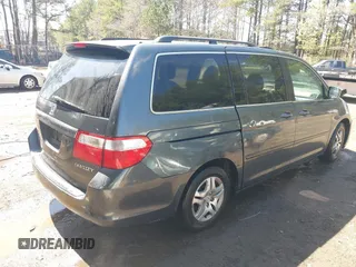 2005 Honda Odyssey EX-L with VIN 5FNRL387X5B069823, listed as a IAAI auction lot 41883007 with 267,250 mi miles and . Bid and sale history available at DreamBid. Image 4.