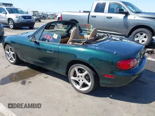 2001 Mazda MX-5 Miata with VIN JM1NB353410203981, listed as a IAAI auction lot 42028077 with Not Provided miles and . Bid and sale history available at DreamBid. Image 3.