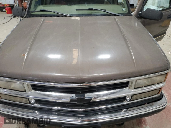 1998 Chevrolet Tahoe z VIN 1GNEK13R0WJ302401, wystawiony jako Copart lot #47196925 z przebiegiem 202 595 mil mil oraz Szkoda całkowita • Salvage title. Historia ofert i sprzedaży dostępna na DreamBid. Obrazek 13.