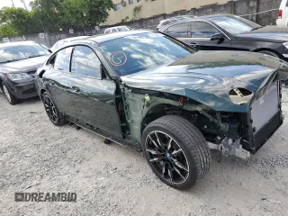 2024 BMW i4 M50 with VIN WBY33AW08RFS09819, listed as a Copart auction lot 47390474 with 593 mi miles and Salvage Title. Bid and sale history available at carsss.com. Image 4.