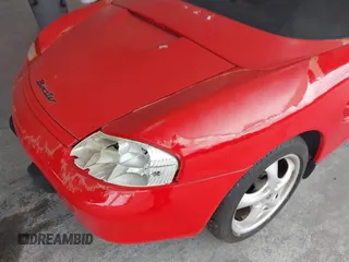 1999 Porsche Boxster z VIN WP0CA2985XU621543, wystawiony jako IAAI lot #42210875 z przebiegiem 93 609 mil mil oraz . Historia ofert i sprzedaży dostępna na DreamBid. Obrazek 12.