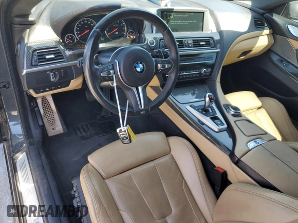 2015 BMW M6 z VIN WBSLX9C58FD160609, wystawiony jako Copart lot #56992535 z przebiegiem 52 324 mil mil oraz Tytuł czysty. Historia ofert i sprzedaży dostępna na DreamBid. Obrazek 8.
