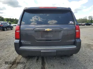 2015 Chevrolet Tahoe LTZ with VIN 1GNSKCKC9FR698924, listed as a Copart auction lot 56196895 with 184,740 mi miles and Salvage title. Bid and sale history available at DreamBid. Image 6.