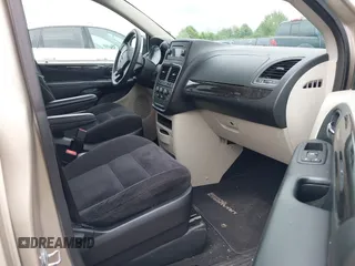 2014 Dodge Grand Caravan American Value with VIN 2C4RDGBGXER197092, listed as a IAAI auction lot 40020177 with 25,192 mi miles and . Bid and sale history available at DreamBid. Image 5.