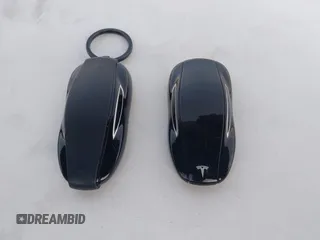 2016 Tesla Model S 90D z VIN 5YJSA1E26GF156108, wystawiony jako IAAI lot #41453148 z przebiegiem 74 717 mil mil oraz . Historia ofert i sprzedaży dostępna na DreamBid. Obrazek 11.