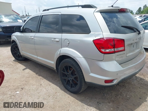 2013 Dodge Journey SXT with VIN 3C4PDCBG3DT701686, listed as a IAAI auction lot 42072002 with Not Provided miles. Bid and sale history available at carsss.com. Image 3.