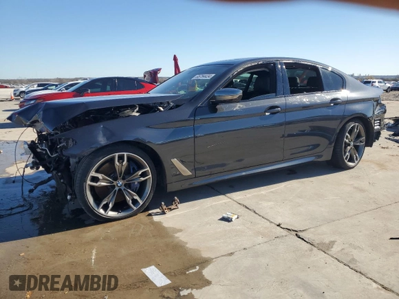 2020 BMW 5 Series M550i xDrive with VIN WBAJS7C07LCD97275, listed as a Copart auction lot 85764434 with Not provided miles and Clean title. Bid and sale history available at DreamBid. Image 1.