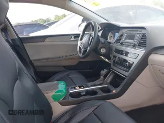 2015 Hyundai Sonata SE with VIN 5NPE24AF6FH155674, listed as a IAAI auction lot 42044580 with 233,802 mi miles and . Bid and sale history available at DreamBid. Image 5.