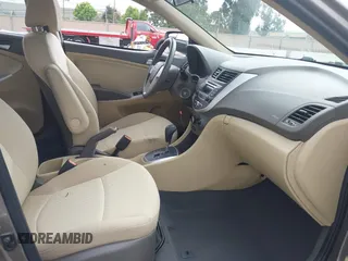 2014 Hyundai Accent GLS z VIN KMHCT4AE4EU758926, wystawiony jako IAAI lot #42451816 z przebiegiem 80 387 mil mil oraz . Historia ofert i sprzedaży dostępna na DreamBid. Obrazek 5.