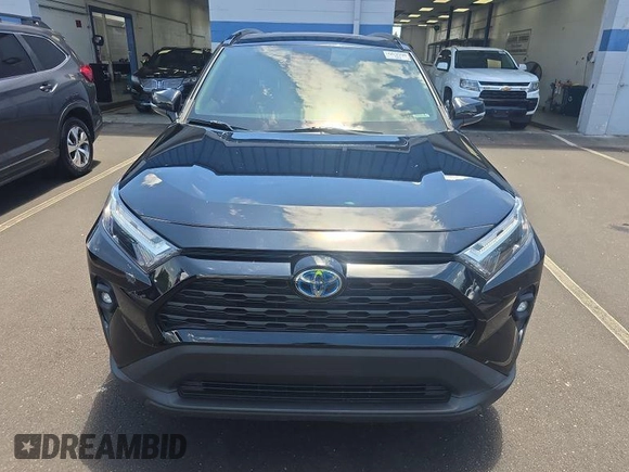 2022 Toyota RAV4 Hybrid XLE Premium z VIN 4T3B6RFVXNU071885, wystawiony jako IAAI lot #42730174 z przebiegiem 53 502 mil mil oraz . Historia ofert i sprzedaży dostępna na DreamBid. Obrazek 9.