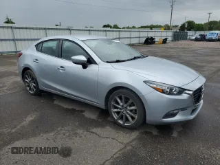 2018 Mazda 3 Touring z VIN 3MZBN1V38JM206424, wystawiony jako Copart lot #57914015 z przebiegiem 93 095 mil mil oraz Szkoda całkowita • Salvage title. Historia ofert i sprzedaży dostępna na DreamBid. Obrazek 4.