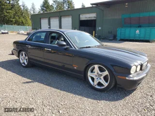 2004 Jaguar XJ with VIN SAJWA73B44TG20291, listed as a Copart auction lot 54452375 with 148,491 mi miles and Clean Title. Bid and sale history available at carsss.com. Image 4.