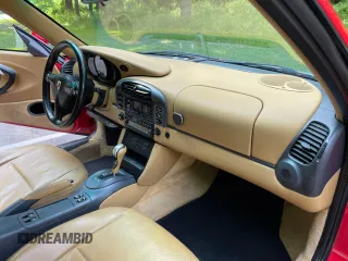 1999 Porsche 911 z VIN WP0AA2991XS620689, wystawiony jako Copart lot #59999925 z przebiegiem 152 508 mil mil oraz Czysty tytuł • Clean title. Historia ofert i sprzedaży dostępna na DreamBid. Obrazek 9.