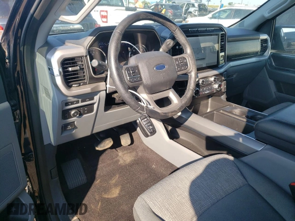 2021 Ford F-150 XL with VIN 1FTFX1E88MKD05444, listed as a Copart auction lot 71669704 with 35,779 mi miles and Salvage title. Bid and sale history available at DreamBid. Image 8.