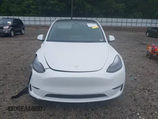 2024 Tesla Model Y with VIN 7SAYGDED9RA331840, listed as a IAAI auction lot 42350926 with 13,818 mi miles and . Bid and sale history available at DreamBid. Image 12.