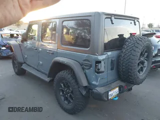 2024 Jeep Wrangler Sport S with VIN 1C4RJXN64RW337985, listed as a IAAI auction lot 41261982 with 1,845 mi miles and . Bid and sale history available at DreamBid. Image 3.