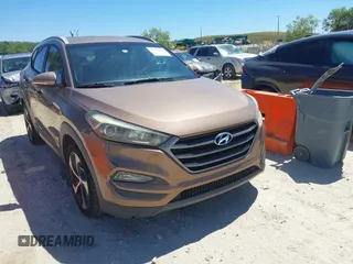 2016 Hyundai Tucson Sport with VIN KM8J33A29GU054909, listed as a IAAI auction lot 41835688 with 90,751 mi miles. Bid and sale history available at carsss.com. Image 6.