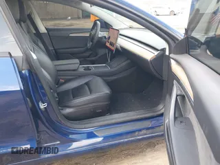 2022 Tesla Model 3 with VIN 5YJ3E1EA7NF188417, listed as a IAAI auction lot 41885623 with 105,457 mi miles and . Bid and sale history available at DreamBid. Image 5.