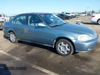 2000 Honda Civic EX with VIN 2HGEJ8643YH583698, listed as a IAAI auction lot 42000622 with 237,379 mi miles. Bid and sale history available at carsss.com. Image 1.
