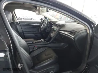 2018 Ford Fusion Hybrid Titanium with VIN 3FA6P0RU0JR269389, listed as a IAAI auction lot 41736152 with 112,640 mi miles. Bid and sale history available at carsss.com. Image 5.