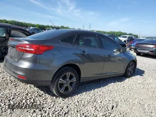 2016 Ford Focus SE with VIN 1FADP3FE8GL381855, listed as a Copart auction lot 57366645 with 104,709 mi miles and Salvage title. Bid and sale history available at DreamBid. Image 3.