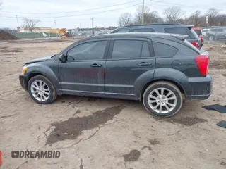 2011 Dodge Caliber Heat with VIN 1B3CB5HA7BD110672, listed as a IAAI auction lot 41709487 with 59,679 mi miles and . Bid and sale history available at DreamBid. Image 14.