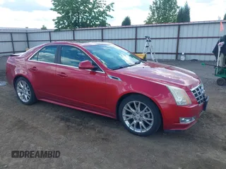 2012 Cadillac CTS Premium z VIN 1G6DS5E31C0104841, wystawiony jako IAAI lot #42292295 z przebiegiem 124 477 mil mil oraz . Historia ofert i sprzedaży dostępna na DreamBid. Obrazek 1.