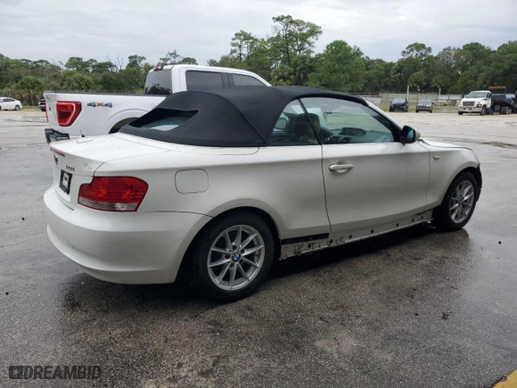 2011 BMW 1 Series 128i with VIN WBAUN1C5XBVH82605, listed as a Copart auction lot 73457334 with 94,969 mi miles and Salvage Title. Bid and sale history available at carsss.com. Image 3.