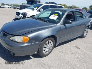 2005 Pontiac Grand Am SE with VIN 1G2NE52E25M101462, listed as a IAAI auction lot 41743136 with 77,376 mi miles. Bid and sale history available at carsss.com. Image 2.