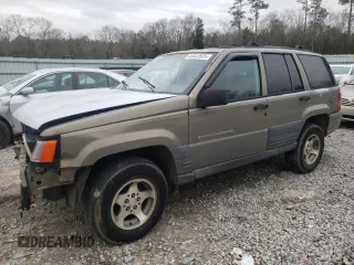 1996 Jeep Grand Cherokee Laredo with VIN 1J4FX58S5TC248122, listed as a Copart auction lot 45843935 with 295,521 mi miles and Salvage Title. Bid and sale history available at carsss.com. Image 1.