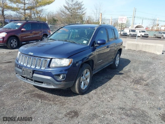 2014 Jeep Compass Latitude with VIN 1C4NJDEB1ED661864, listed as a IAAI auction lot 41950564 with 106,833 mi miles. Bid and sale history available at carsss.com. Image 2.