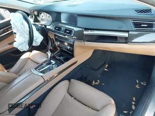 2012 BMW 7 Series 750Li xDrive with VIN WBAKC8C53CC435553, listed as a IAAI auction lot 41852097 with 127,418 mi miles and . Bid and sale history available at DreamBid. Image 5.