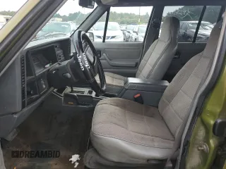 1996 Jeep Cherokee Sport with VIN 1J4FJ68S9TL291661, listed as a Copart auction lot 71968934 with 139,695 mi miles and Salvage Title. Bid and sale history available at carsss.com. Image 7.