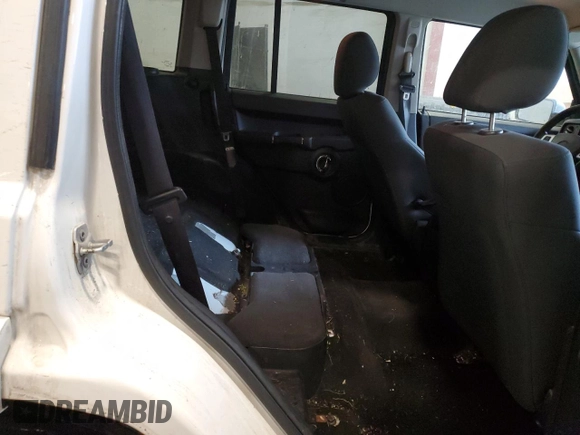2010 Jeep Commander Sport z VIN 1J4RG4GK2AC158450, wystawiony jako Copart lot #46210865 z przebiegiem 222 500 mil mil oraz Szkoda całkowita • Salvage title. Historia ofert i sprzedaży dostępna na DreamBid. Obrazek 12.
