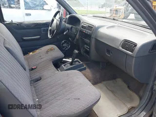 1997 Nissan Frontier XE with VIN 1N6SD11S0VC334308, listed as a IAAI auction lot 42468050 with 250,965 mi miles and . Bid and sale history available at DreamBid. Image 5.