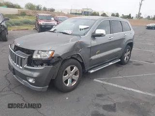 2013 Jeep Grand Cherokee Limited with VIN 1C4RJEBTXDC539433, listed as a IAAI auction lot 42046724 with 266,913 mi miles. Bid and sale history available at carsss.com. Image 2.