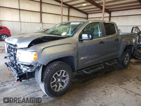 2022 GMC Canyon 4WD AT4 z VIN 1GTG6FEN0N1162393, wystawiony jako Copart lot #55286065 z przebiegiem 55 185 mil mil oraz Szkoda całkowita • Salvage title. Historia ofert i sprzedaży dostępna na DreamBid. Obrazek 1.