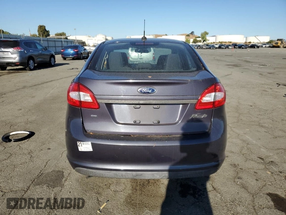 2013 Ford Fiesta SE z VIN 3FADP4BJ9DM186382, wystawiony jako Copart lot #67754934 z przebiegiem 157 495 mil mil oraz Szkoda całkowita • Salvage title. Historia ofert i sprzedaży dostępna na DreamBid. Obrazek 6.