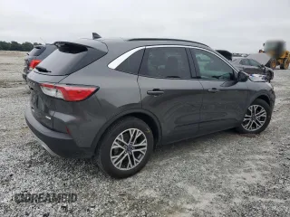 2020 Ford Escape SEL with VIN 1FMCU0H61LUA10541, listed as a Copart auction lot 58699915 with 45,149 mi miles and Salvage title. Bid and sale history available at DreamBid. Image 3.