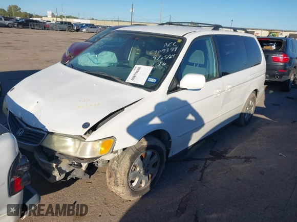 2002 Honda Odyssey EX z VIN 2HKRL18602H522128, wystawiony jako IAAI lot #40879648 z przebiegiem Nie podano mil oraz . Historia ofert i sprzedaży dostępna na DreamBid. Obrazek 2.