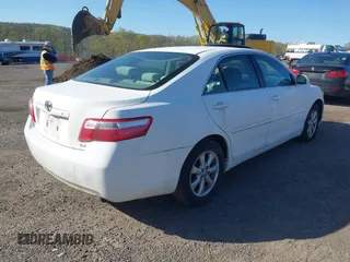 2009 Toyota Camry with VIN 4T1BE46K49U813806, listed as a IAAI auction lot 42141396 with 165,619 mi miles. Bid and sale history available at carsss.com. Image 4.