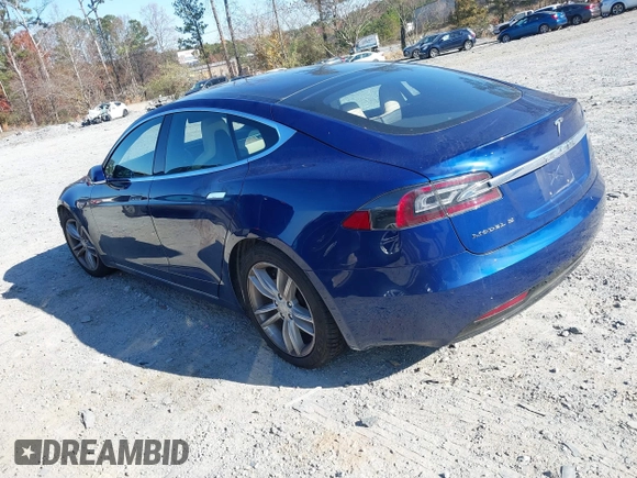 2016 Tesla Model S 90D with VIN 5YJSA1E25GF144614, listed as a IAAI auction lot 40941311 with 83,587 mi miles and . Bid and sale history available at DreamBid. Image 3.