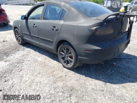 2008 Mazda 3 i Touring *Ltd Avail with VIN JM1BK32F781873126, listed as a IAAI auction lot 42004699 with 208,536 mi miles. Bid and sale history available at carsss.com. Image 3.