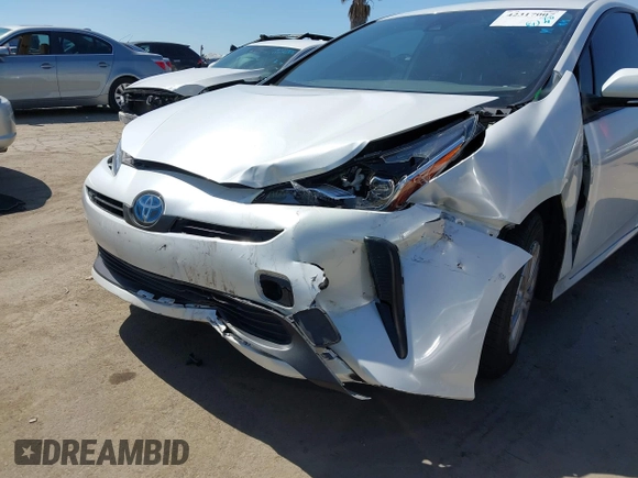 2021 Toyota Prius L Eco with VIN JTDKAMFU8M3135142, listed as a IAAI auction lot 42317007 with 77,353 mi miles and . Bid and sale history available at DreamBid. Image 6.