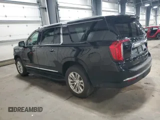2021 GMC Yukon XL SLT with VIN 1GKS2GKDXMR371393, listed as a Copart auction lot 85052824 with 104,432 mi miles and Salvage Title. Bid and sale history available at carsss.com. Image 2.