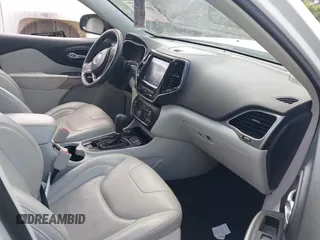 2019 Jeep Cherokee Limited z VIN 1C4PJMDN6KD151073, wystawiony jako IAAI lot #41572426 z przebiegiem 101 316 mil mil oraz . Historia ofert i sprzedaży dostępna na DreamBid. Obrazek 5.
