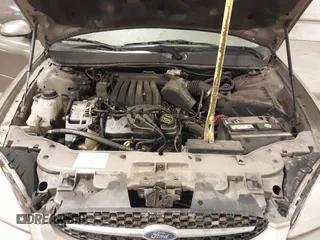 2003 Ford Taurus SES Standard with VIN 1FAFP552X3G184894, listed as a IAAI auction lot 41846677 with 160,824 mi miles. Bid and sale history available at carsss.com. Image 10.