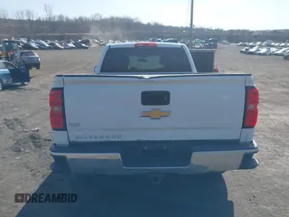 2014 Chevrolet Silverado 1500 Work Truck with VIN 1GCVKPEHXEZ294663, listed as a IAAI auction lot 41811465 with 124,587 mi miles and . Bid and sale history available at DreamBid. Image 16.